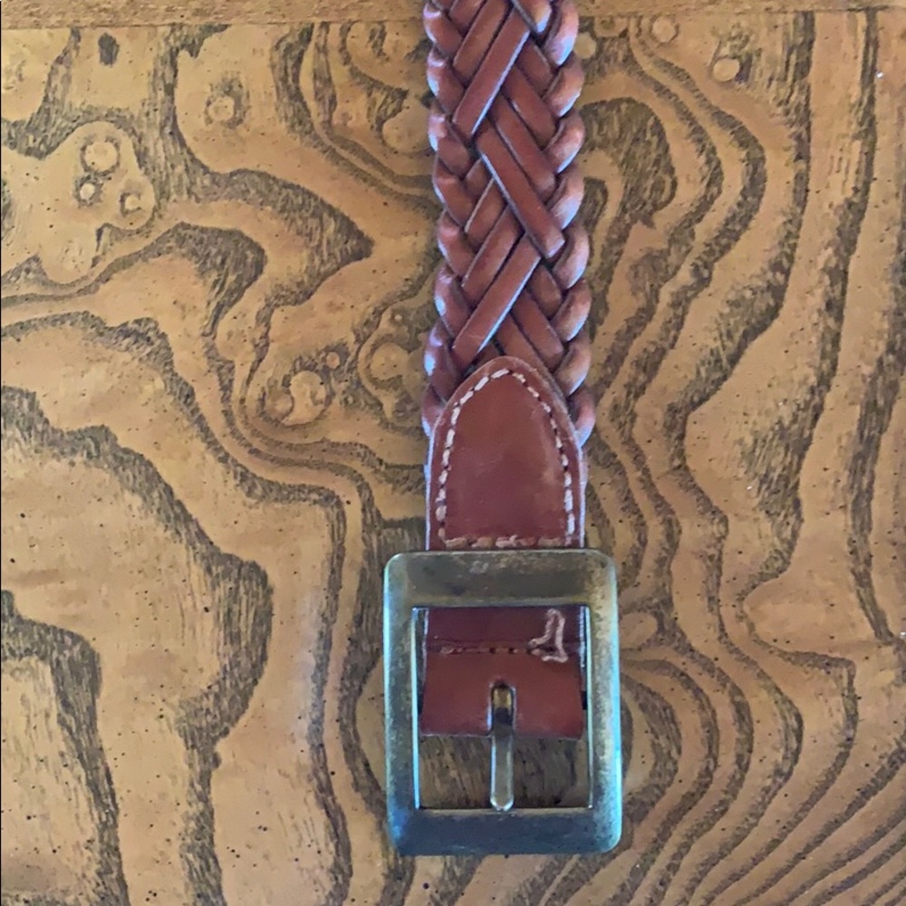 Braided brown leather belt.